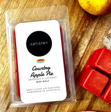 Load image into Gallery viewer, Artistry Country Apple Pie wax melts in a clear plastic clamshell package, placed on a wooden surface with red wax melts an apple nearby.